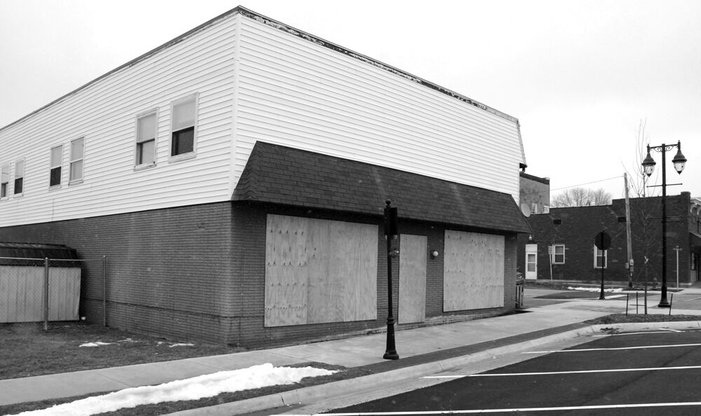 City tearing down candy store