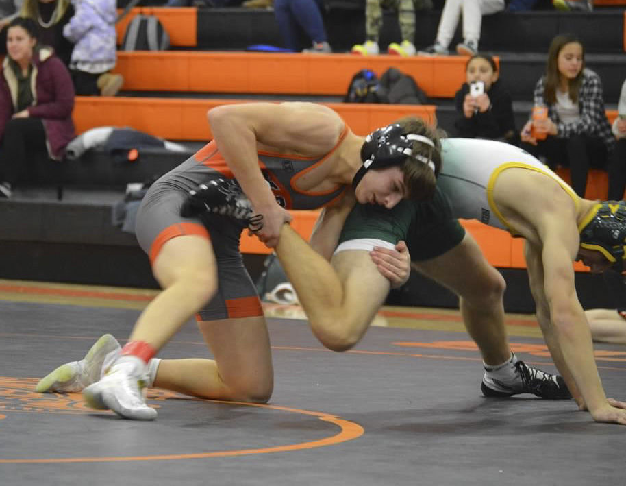 Solon&#8217;s Charlie Karam works to a 17-0 technical fall over Beckman&#8217;s Riley White in 4:57.