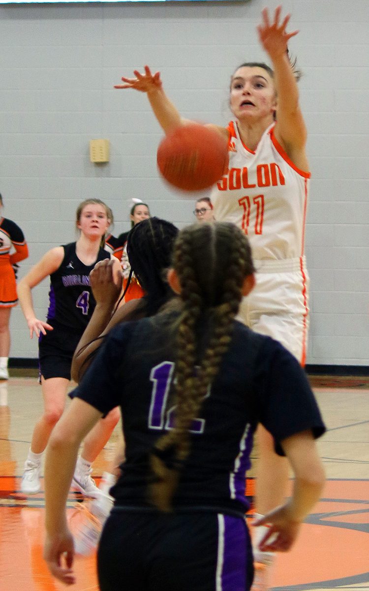 Solon senior Kaia Holtkamp blocks a pass up court by a Burlington Grayhound during the Lady Spartans&#8217; 70-9 thrashing of Burlington, at home, on Wednesday, Feb. 16, in the Class 4A Region 4 Quarterfinal.