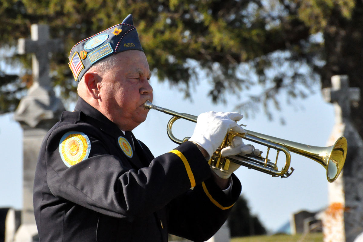 <p>Robert (Bob) Zeman, a member of the Sons of the American Legion at American Legion Stinocher Post 460 in Solon, played Taps at a 2009 event at the Johnson County Veterans Memorial. Zeman died in 2014 at the age of 89.</p>