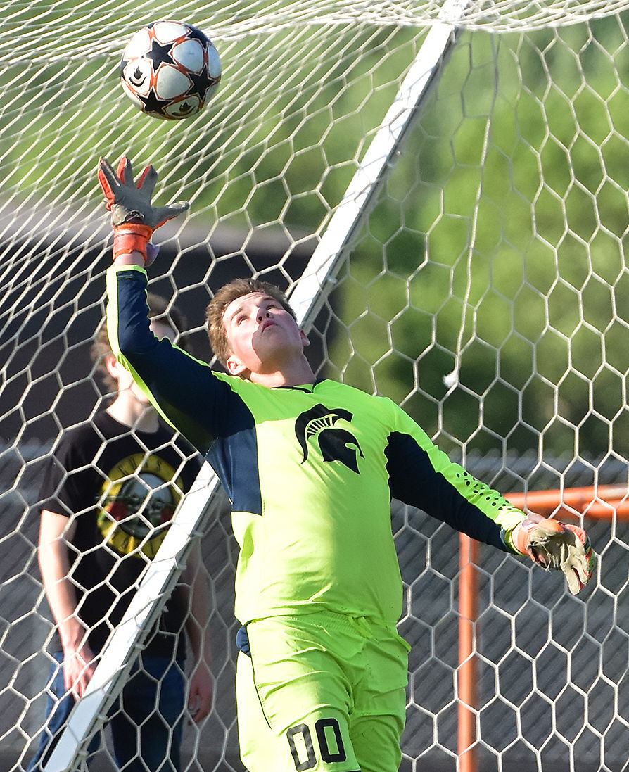 John Peters, shown here in pregame warm-ups, only allowed one goal in a 10-1 substate win over Aplington-Parkersburg/Dike-New Hartford Thursday, May 19 at home.