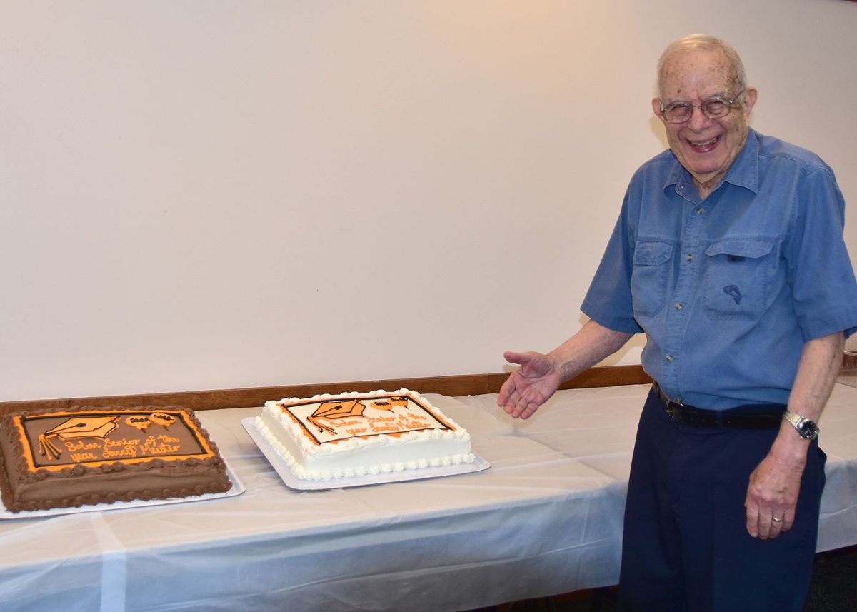 Larry Meister shows off cakes baked in his honor as the 2022 Solon Senior Citizen of the Year. An open house was held Saturday, May 21 for Meister.