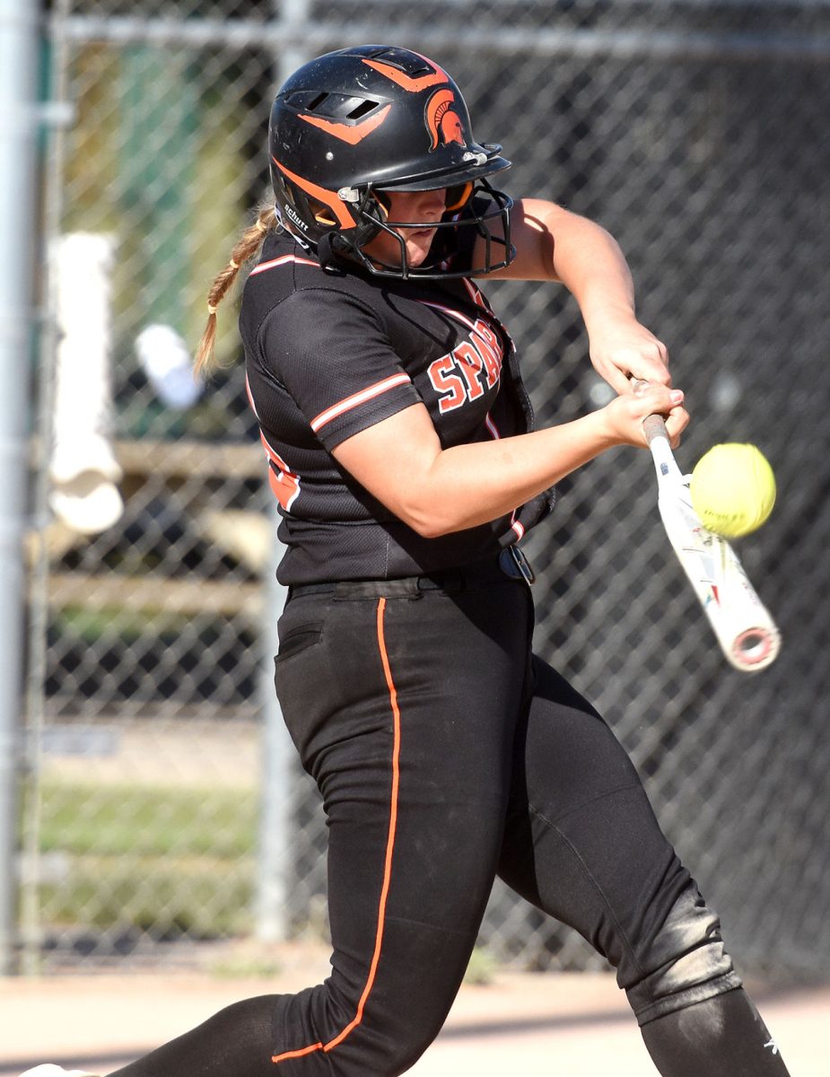 Hillary Wilson makes contact in game one of a varsity doubleheader against rival Mount Vernon Wednesday, June 22 at home. The No.-1 ranked Mustangs swept the Lady Spartans 13-1 and 4-3.