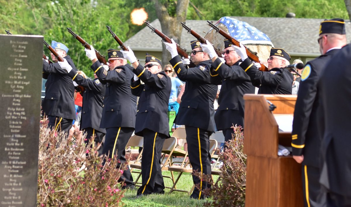 Members of Solon American Legion Stinocher Post 460 fire a rifle salute Monday, May 30 during the annual Memorial Day observance.