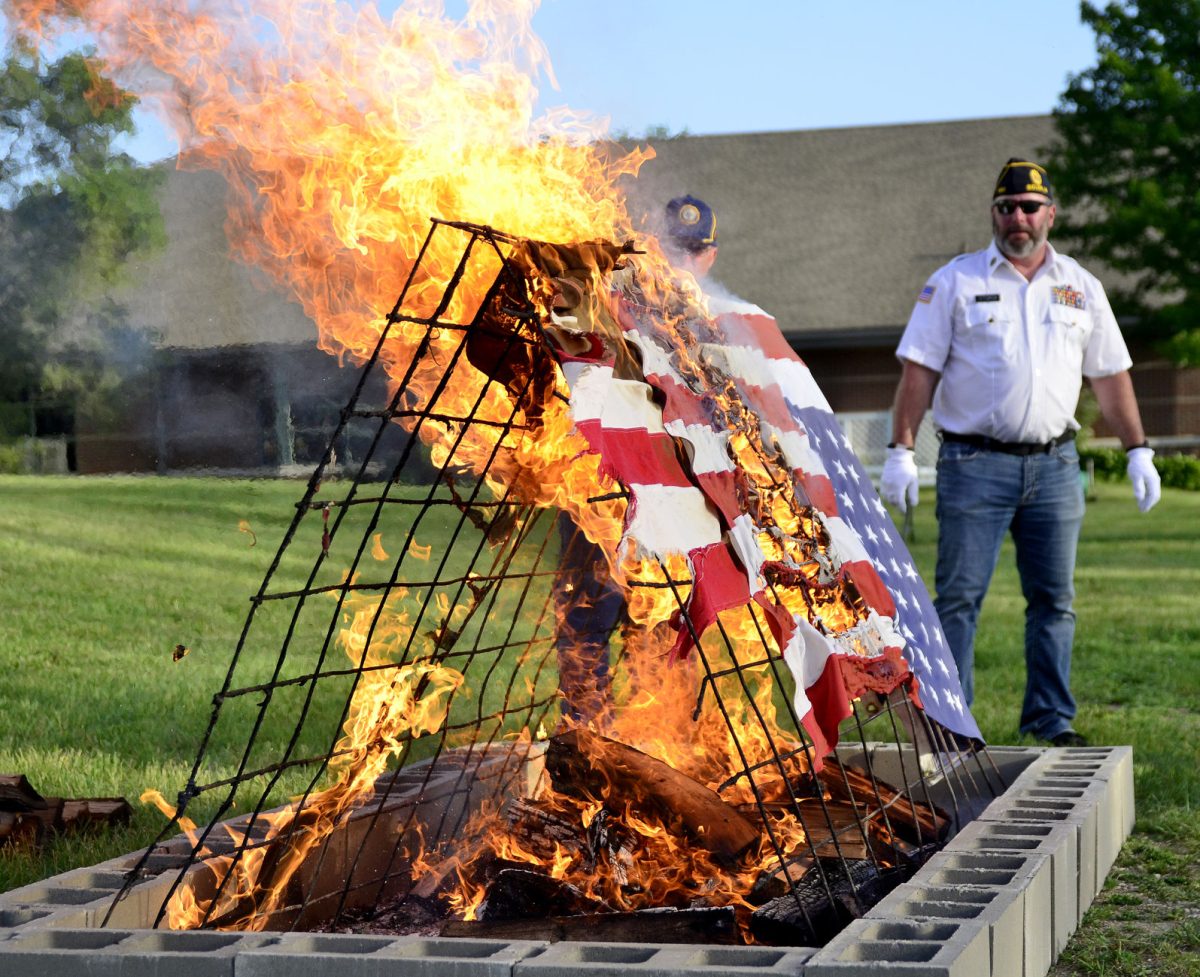 Members of the Solon American Legion Stinocher Post 460 conducted a flag retirement ceremony, in accordance with the Flag Code, Tuesday, June 14. Burning is considered by the code to be the proper way to dispose of a flag, which is no longer serviceable due to its condition.