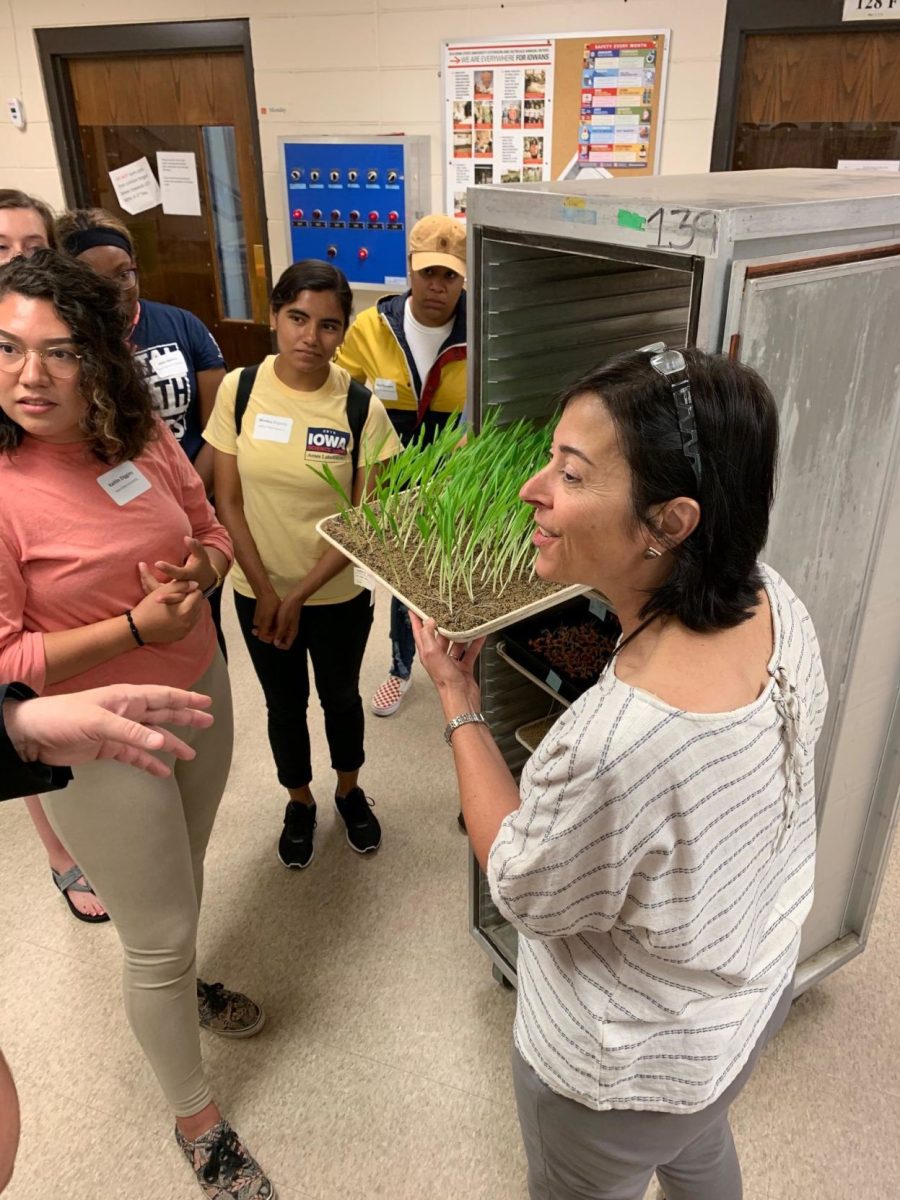 Agronomy Professor Susana Goggi gives a class tour in the Seed Science Center lab.