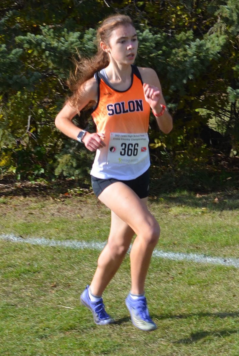 Solon senior Kayla Young anchors a strong returning cast from last year&#8217;s Class 3A cross country champions. Here, Young holds her pace near the top of the pack, near the close of the 3A race in Fort Dodge. She finished fifth overall, fourth in the team placing.