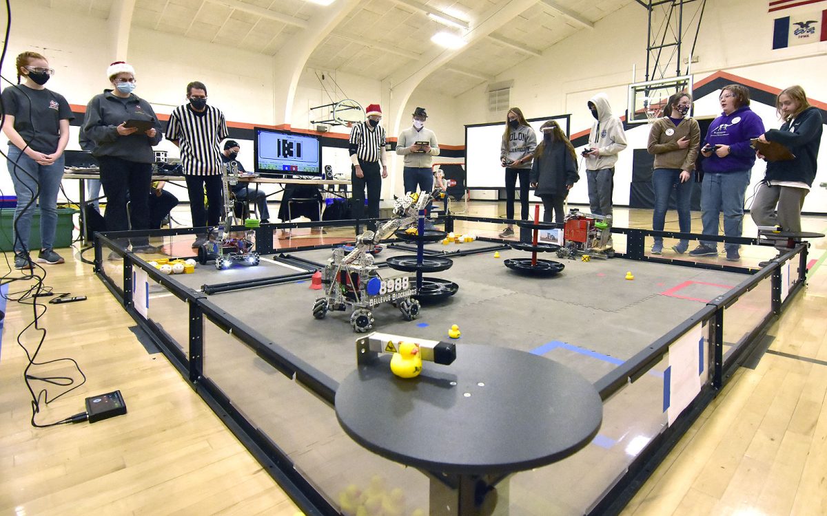 Four robots execute tasks on a 12&#8217;x12&#8217; field during competition last December at the Solon Community Center.