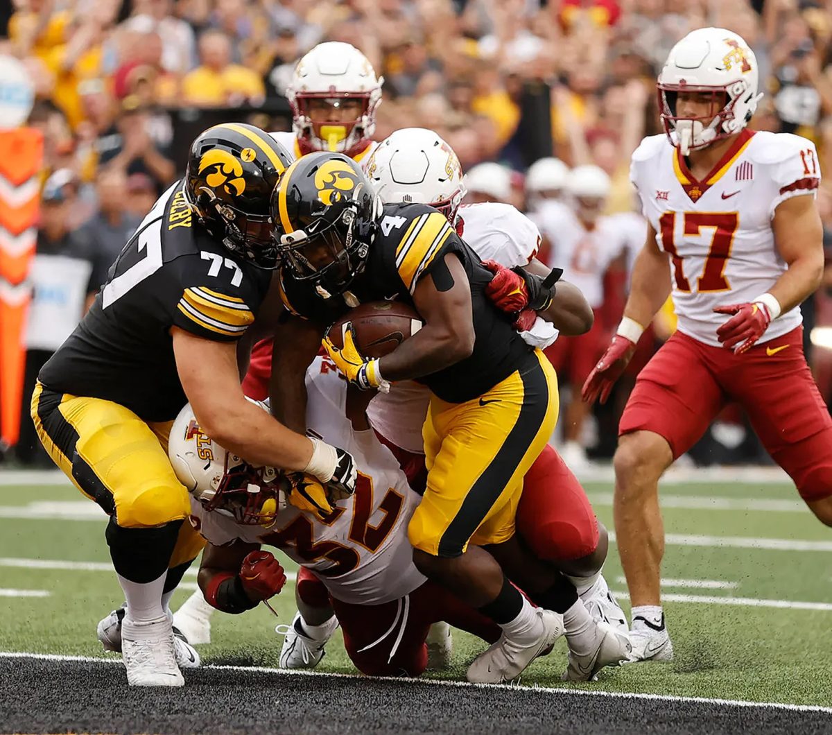 Running back Leshon Williams (4) fights his way into the end zone against the Iowa State Cyclones Saturday, Sept. 10 at Kinnick Stadium