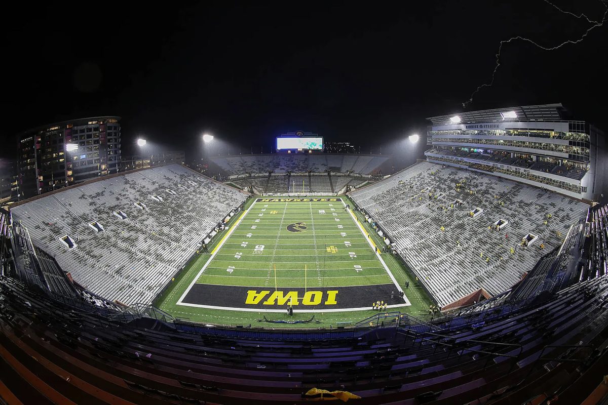 Lightning streaks across the sky above Kinnick Stadium during the Hawkeyes game against Nevada Saturday, Sept. 17. With three lighting delays, the game took seven hours to play to a 27-0 victory.