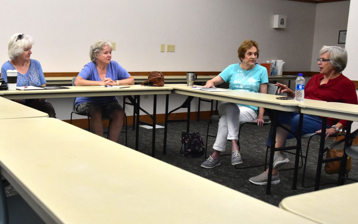 <p>A small group discusses the possibility of a senior citizens center for Solon during a Friday, August 26 meeting at the Solon Public Library.</p>