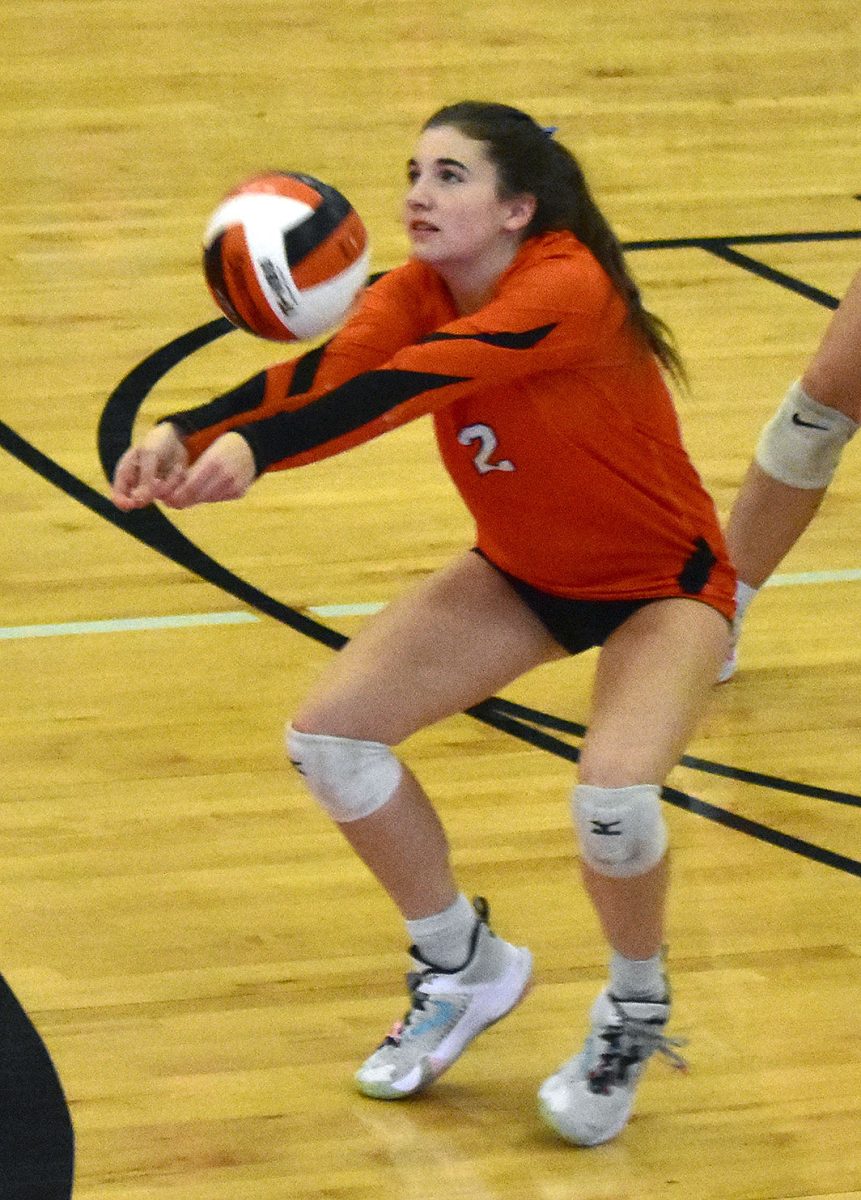 Kennedey Whitford makes a dig Monday, October 17 in a class 3A regional quarterfinal match against Williamsburg.