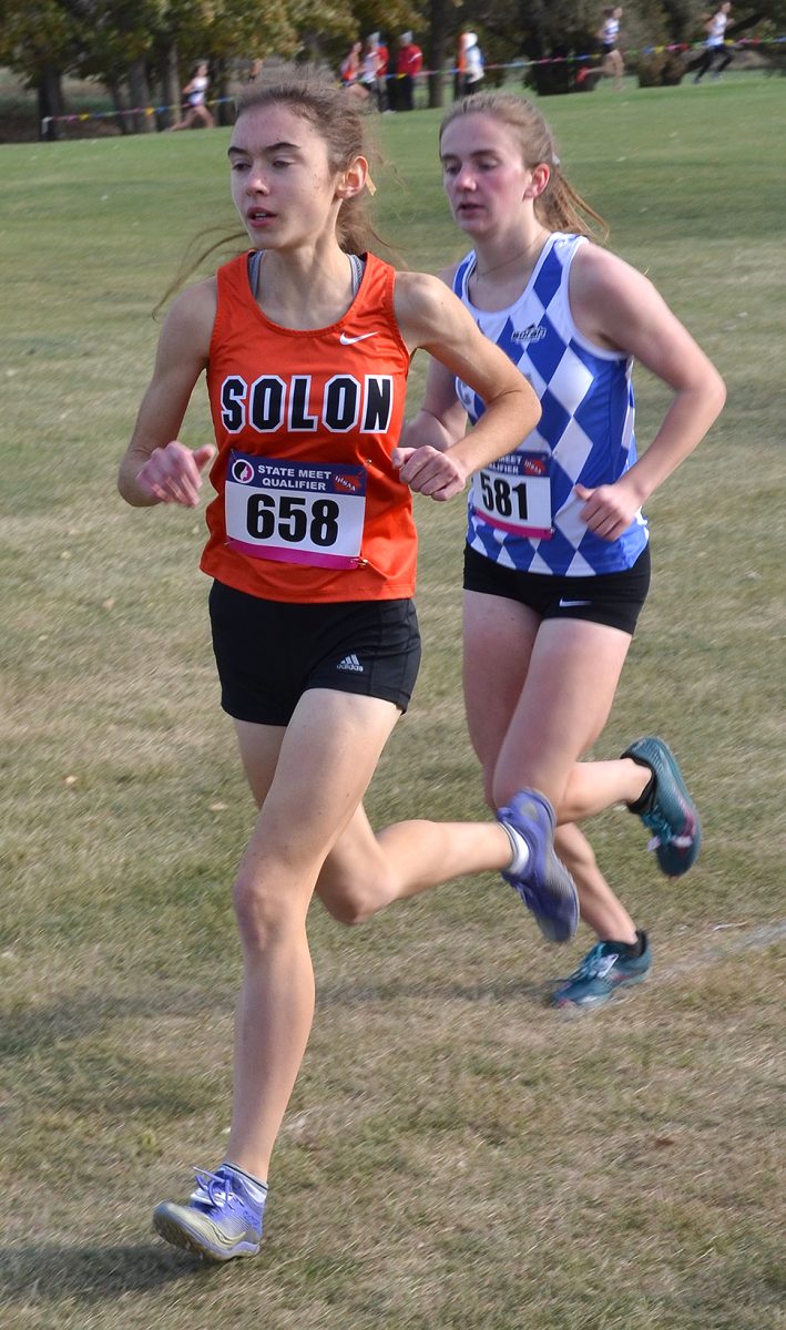 <p>Kayla Young takes the lead, early in the Solon girls’ cross country regional qualifying meet, October 19, in Manchester. Young won the meet in course record time and led Solon’s girls to both the team win and a ticket to the 2022 State Meet in Fort Dodge October 29.</p>