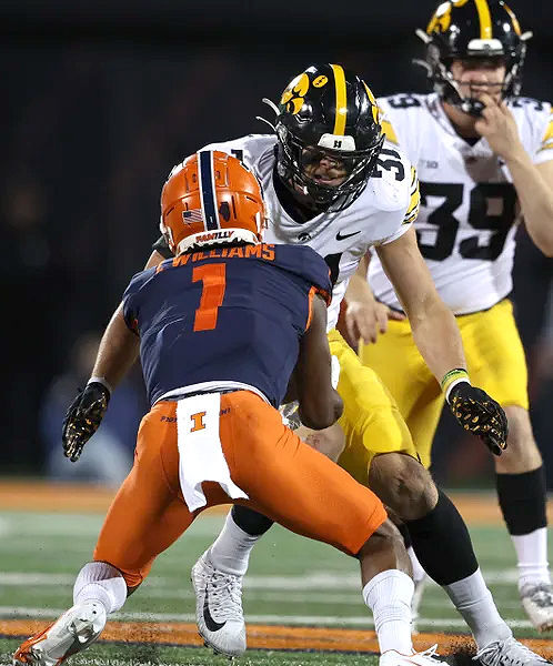 Linebacker Jack Campbell (3) causes a fumble on a punt against the Illinois Fighting Illini Saturday, October 8 at Memorial Stadium in Champaign, Ill.