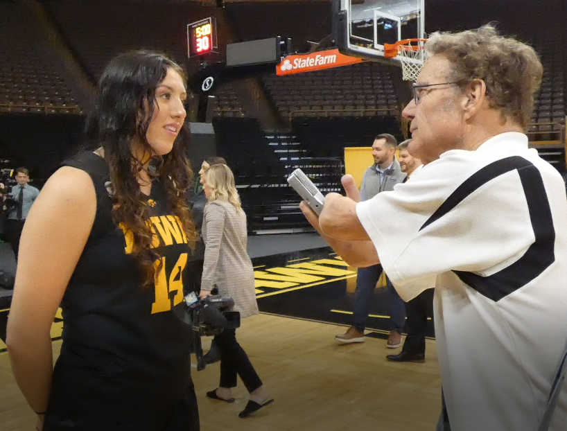 Janette Martin Kleinmeyer speaks with Don Lund during the recent women&#8217;s basketball media day event.