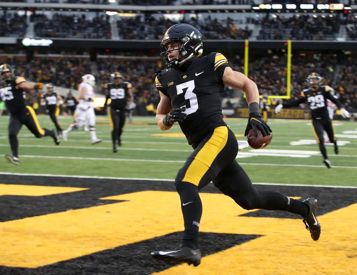 Cooper DeJean (3) returns an interception for a touchdown Saturday, Nov. 12 against the Wisconsin Badgers.