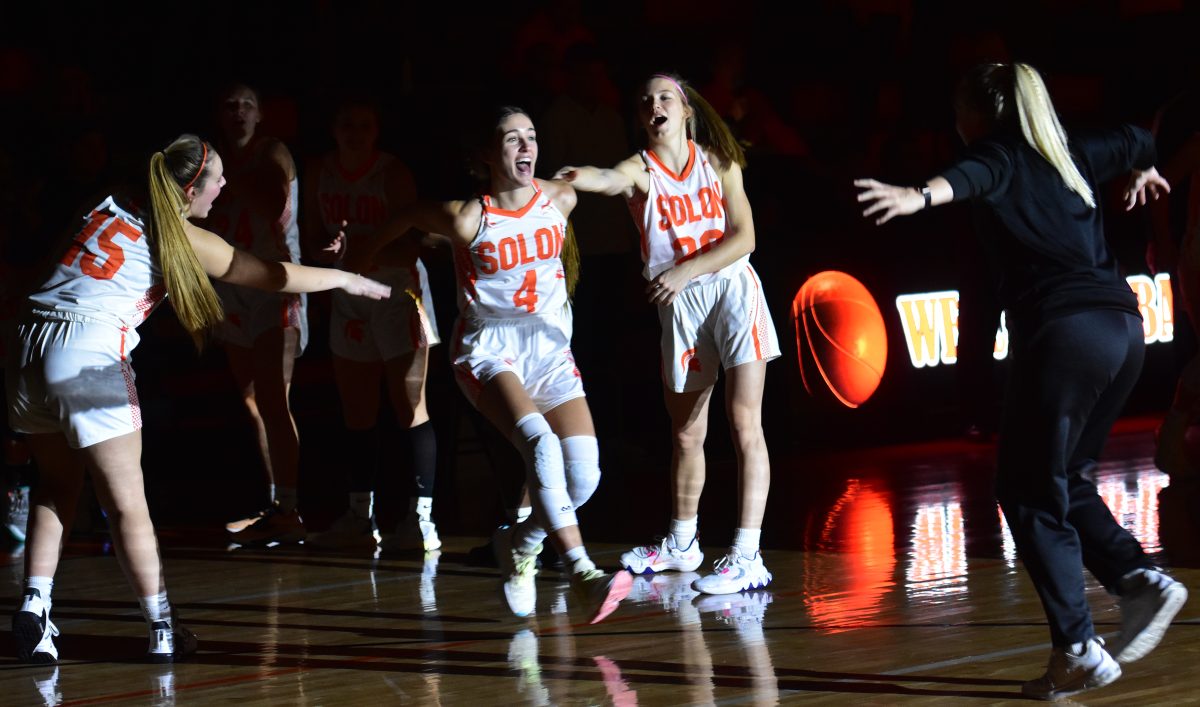 <p>Hailey Miller smiles as she enters the floor during pregame introductions Friday, Dec. 9 at home against CPU. A junior, Miller led all with 26 points against Vinton-Shellsburg and had an eight-point night against the Stormin’ Pointers.</p>