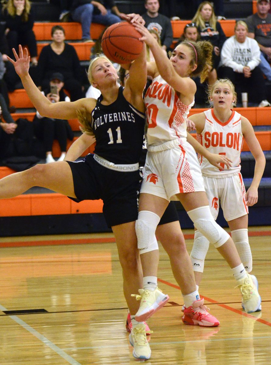 <p>Nodaway Valley’s Annika Nelson (11) fouls Mia Stahle (10) in the first period of a non-conference varsity game Nov. 26 at home.</p>