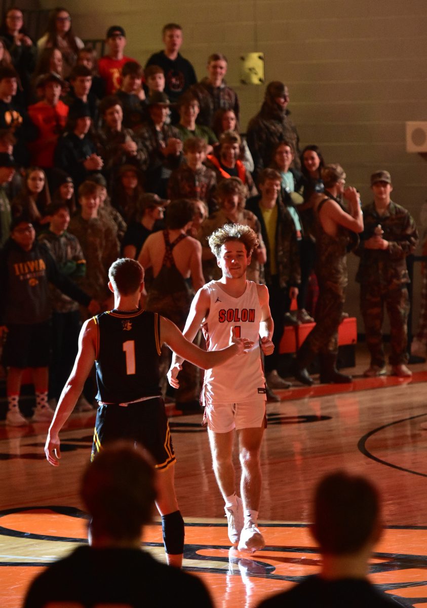 <p>Sean Stahle (1) meets Vinton-Shellsburg’s Cameron Dunbar at midcourt Tuesday, Dec. 6 during introductions before the varsity game. Solon won the WaMaC East vs. WaMaC West contest 62-26 with a team high 13 points from Stahle.</p>