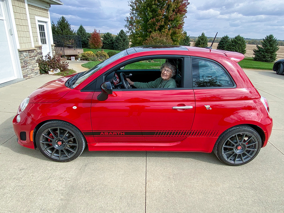 Elioise in her little red car