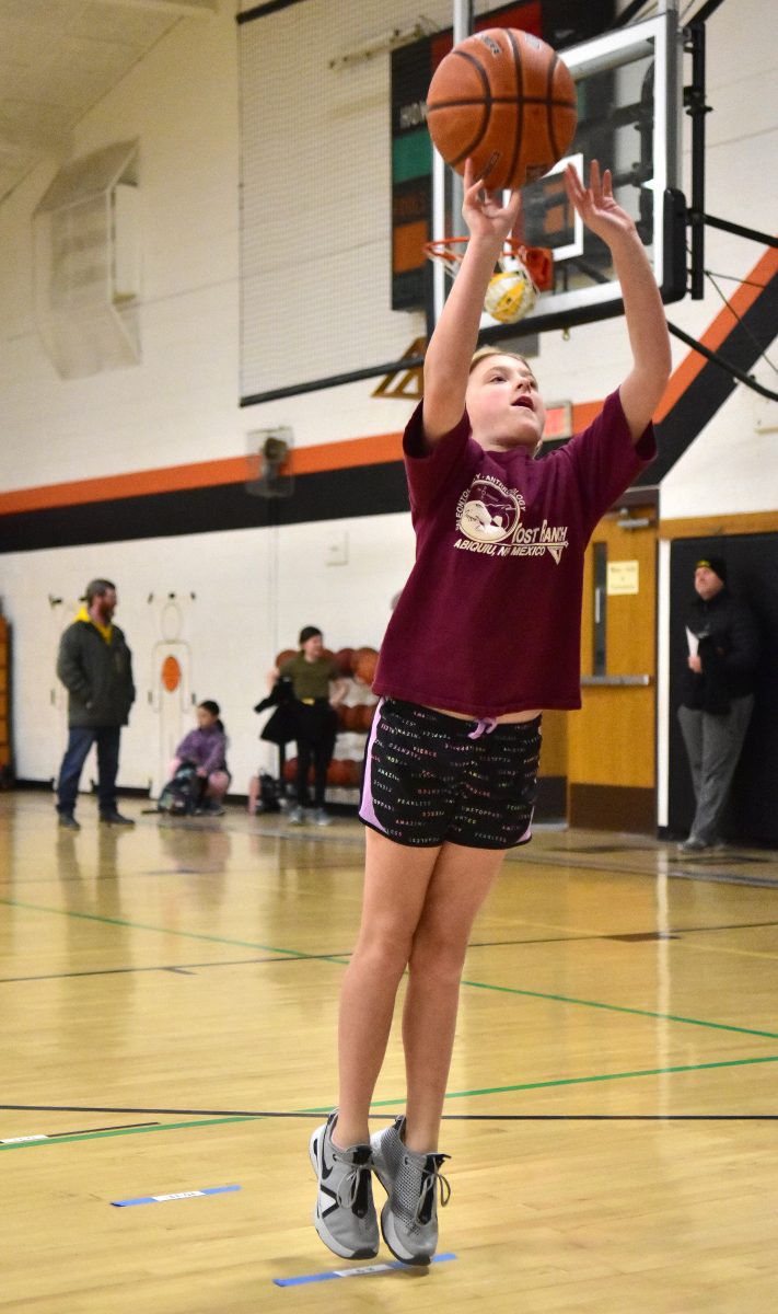 <p>Addi Scheib practices her shooting skills prior to the start of the 2023 Optimist Club of Solon Tri-Star Basketball Contests Sunday, Jan. 29 at the Solon Community Center.</p>