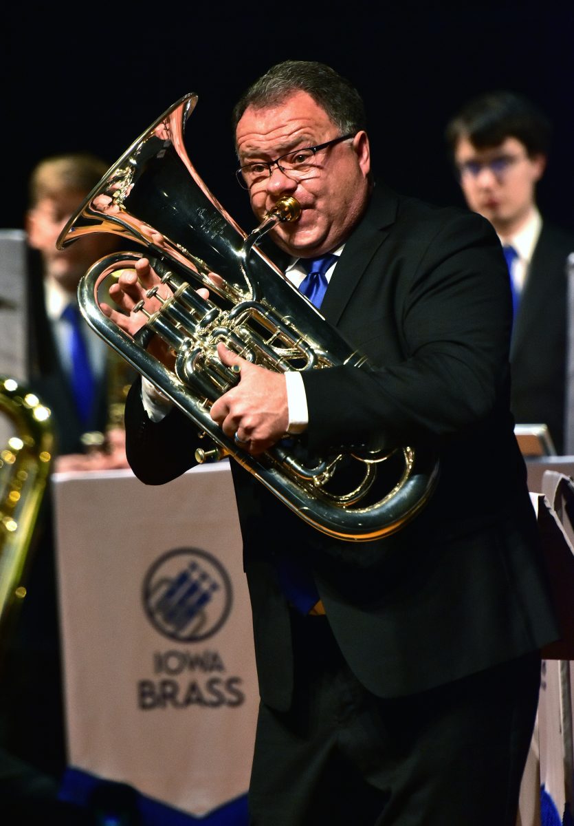 Todd Bransky, from Solon, performs a solo on his euphonium as Iowa Brass performs Paul Lovatt-Cooper&#8217;s Through the Flames, March 5 at the Solon Community Center.