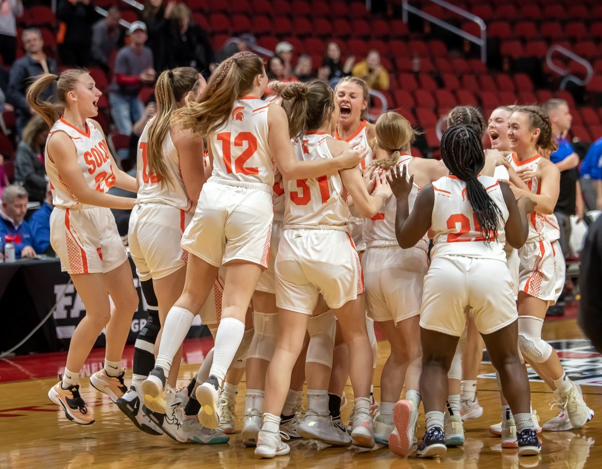 The Lady Spartans celebrate their 54-46 Class 3A Quarterfinals win over Wahlert Catholic (Dubuque) Monday, Feb. 27 at Wells Fargo Arena in Des Moines. The win advanced Solon to the Semifinals on Thursday, March 2. For more photos, turn to page 12A.