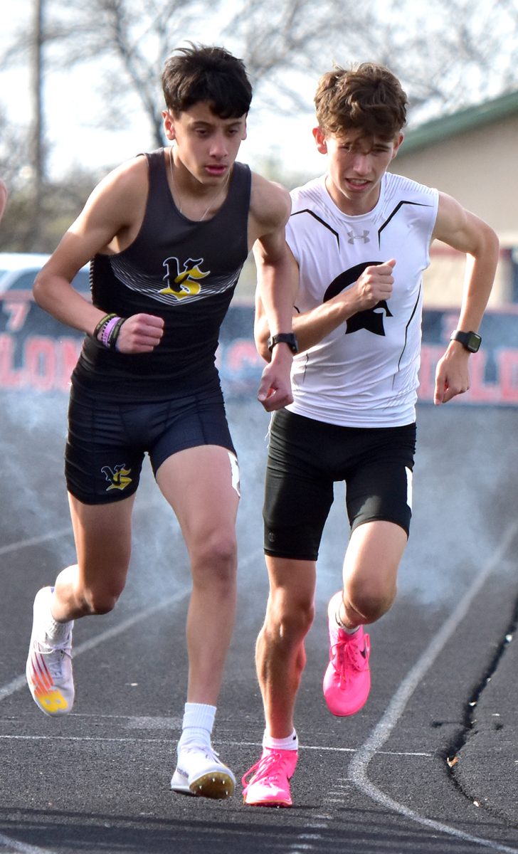 Brick Kabela (at right) was a double winner at the annual Denny Gruber Relays as he took the 1,600-meter run in 4:44.59 and the 3,200 run in 10:14.89.