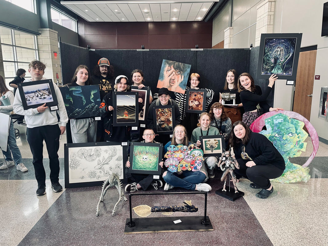 Solon High School students and their work gather at the 2023 WaMaC Art Exhibition at Mount Vernon High School.