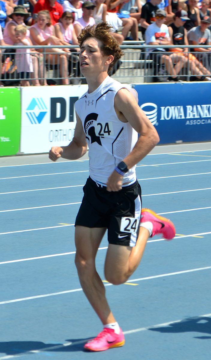 Brick Kabela, shown here in the 1,600-meter run, medaled with an eighth place finish in the 3,200 run and broke the Solon HS record (set by his dad, Mike Kabela) with a time of 9:44.70.