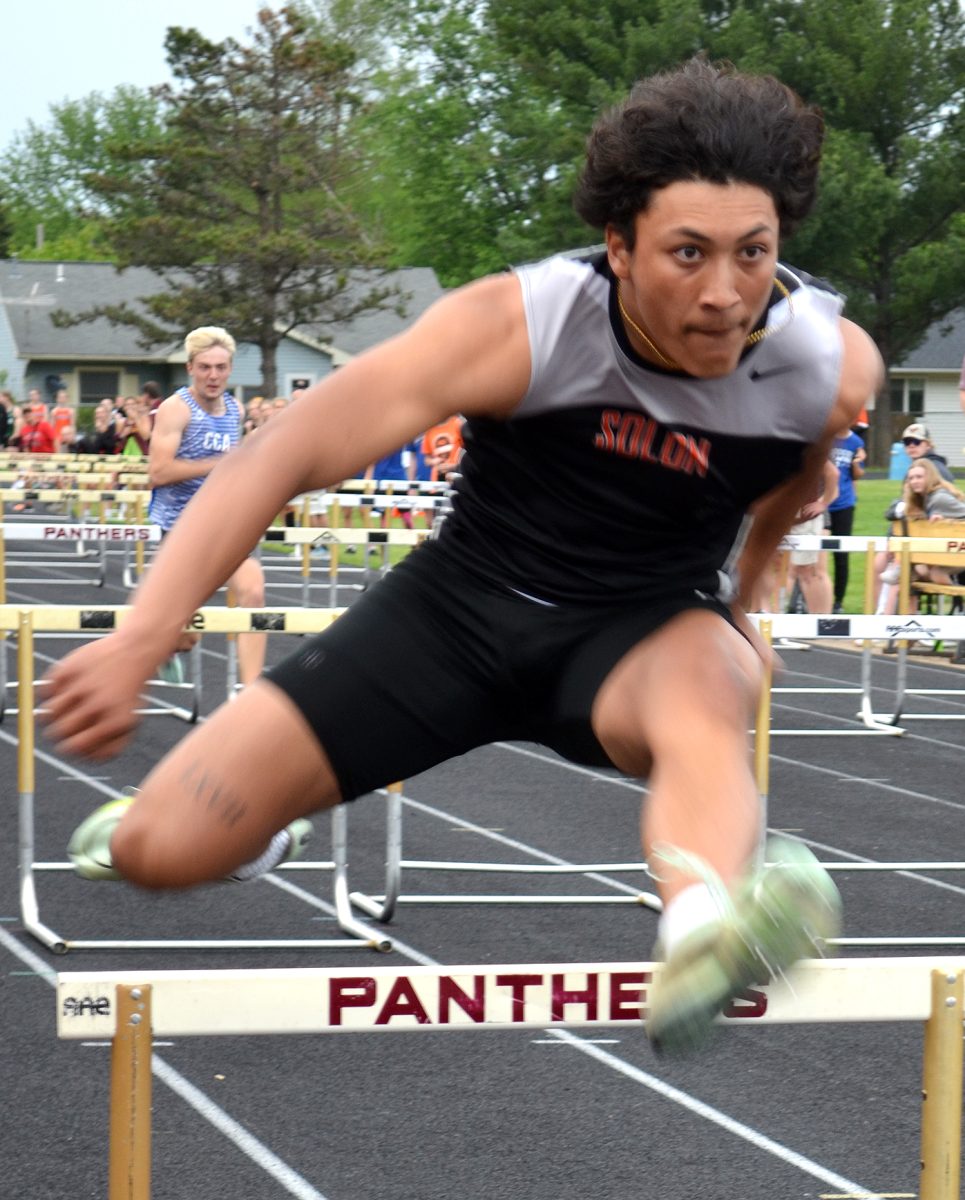 Nash Kotar flies over a hurdle in the State Qualifying shuttle hurdle relay Thursday, May 11 in Mount Pleasant. Charlie Brandt, Cole Carney, Ben Duckett, and Kotar set a new school record with their 1:01.92 finish, which was good for third place and an at-large berth for the State Track and Field Meet this week.