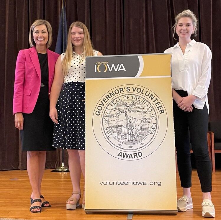 Governor Kim Reynolds presented awards for volunteer service to Madison Craig and Allison Mackin Tuesday, June 6 at the Iowa Braille School in Vinton. The two were among more than 600 volunteers statewide recognized with the Governor&#8217;s Volunteer Awards.