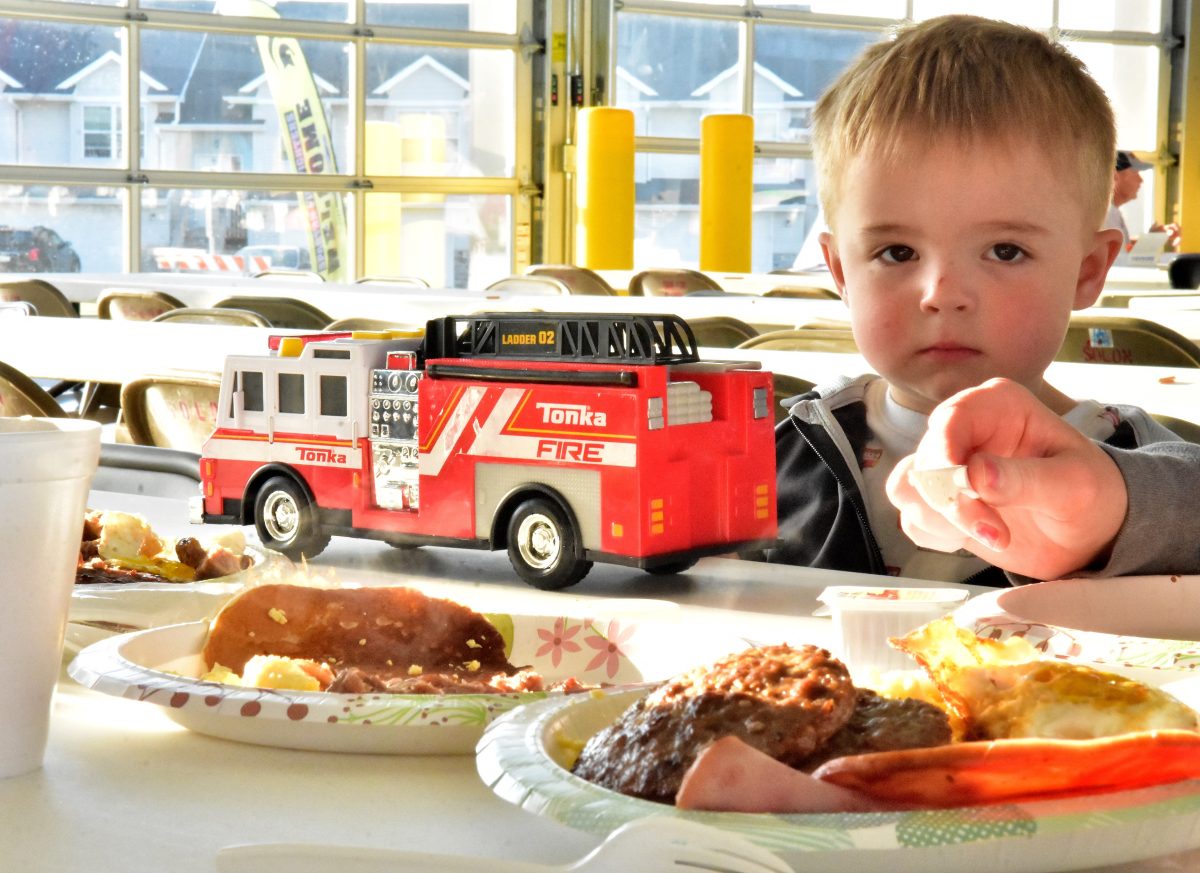 Griffin Showalter, son of Kylie and Charles Showalter, brought his favorite fire truck to the Solon Firefighter&#8217;s Breakfast.