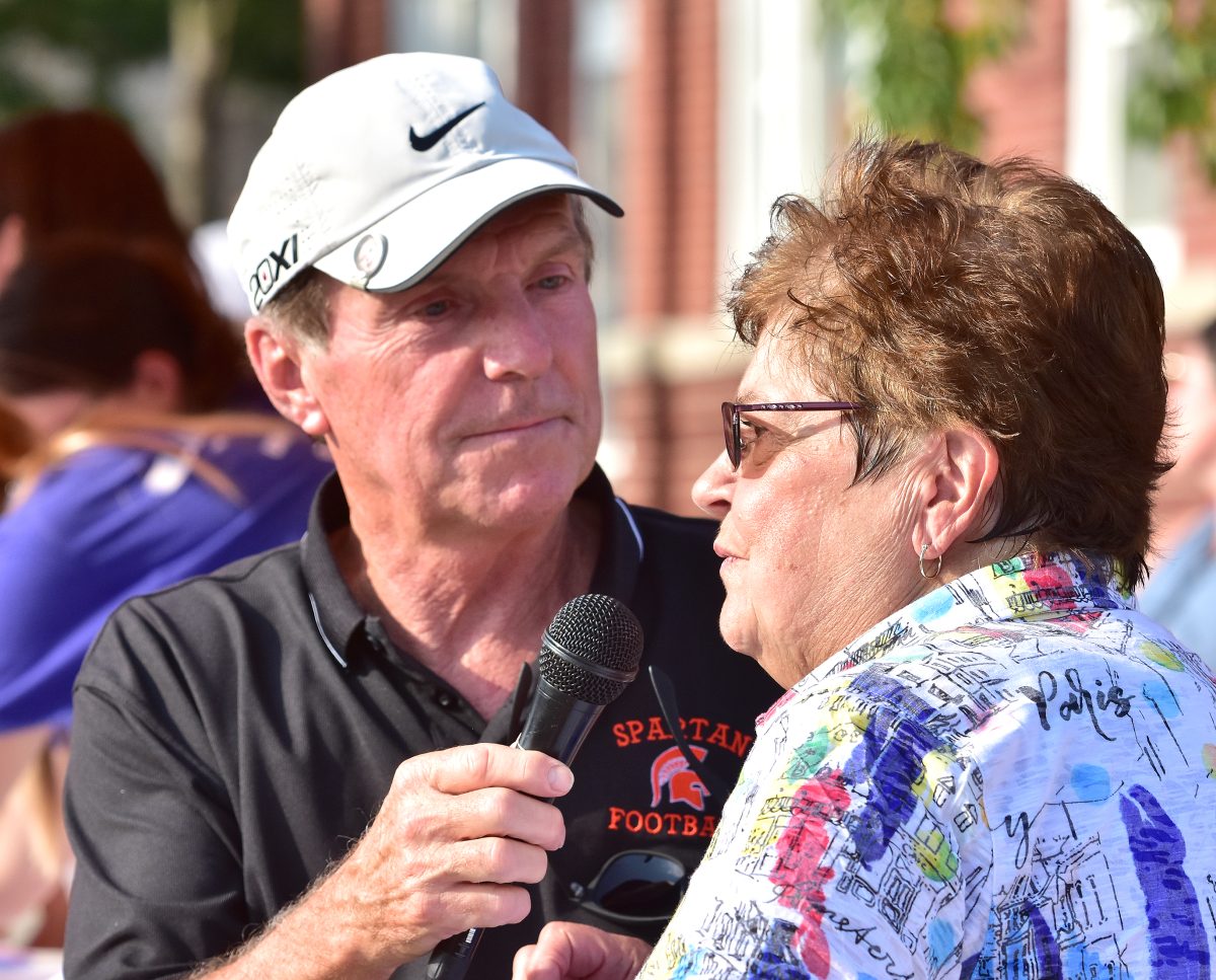 Don Ellis interviews Sherry Carpenter during the 2023 Solon Beef Days Kiddie Tractor Pull Friday, July 21. Sherry and her late husband Bob started the tractor pull some 40 years ago.