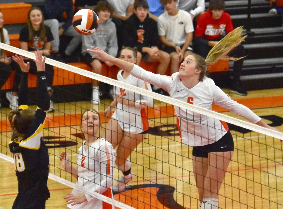 <p>Jozie Lahr (6) slams a kill shot over Central Lee’s Taylor Jones (18) as Brynn Deike (2) and Addie Miller (12) watch in a 3A Region 8 quarterfinal match Tuesday, October 17.</p>