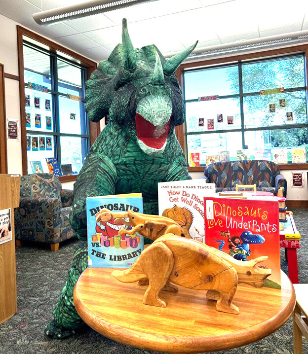 It&#8217;s Dinovember at the Solon Public Library! Trixie (pictured), Bernard, and friends are ready to enjoy the Dino-centric fun all month long!