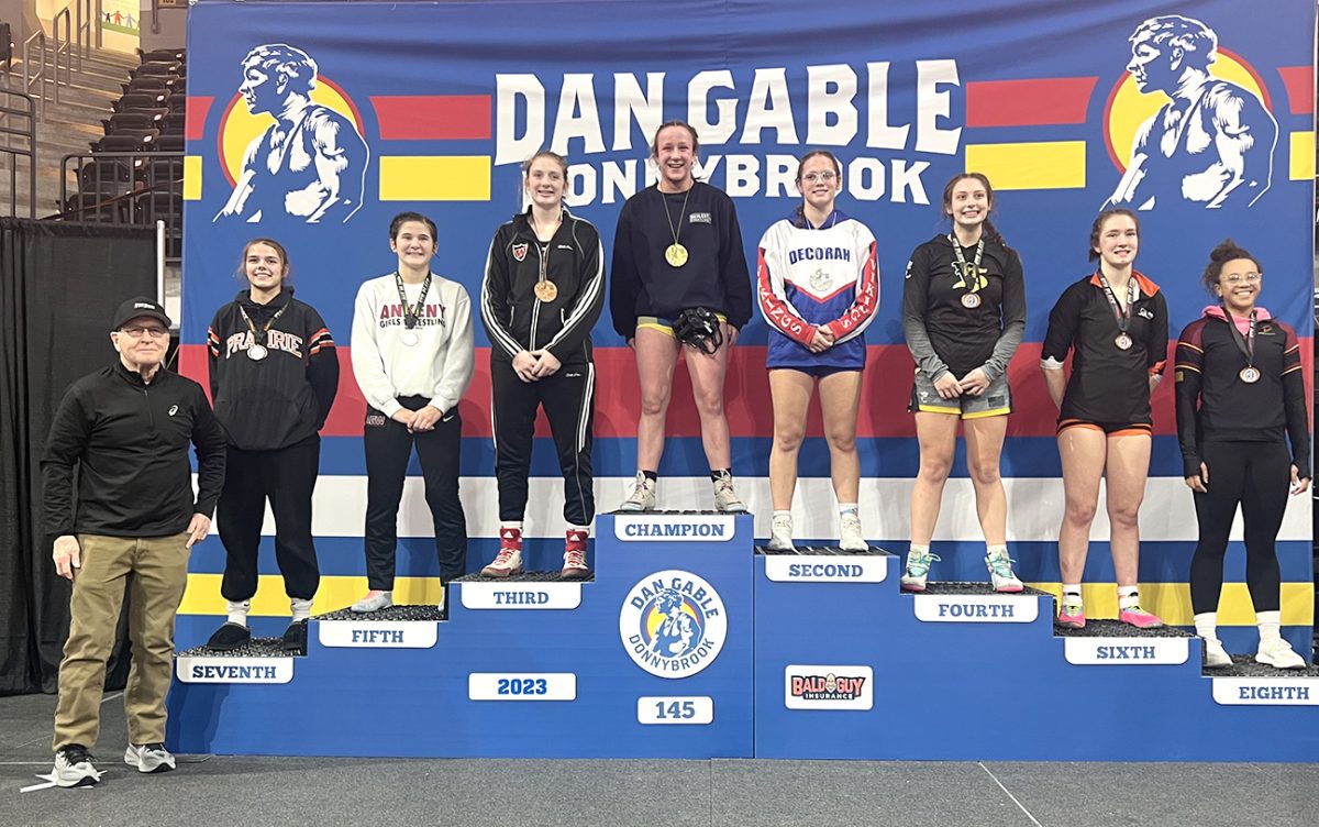 Olivia Bonnema, second from right, finished sixth at 145 pounds at the prestigious Dan Gable Donnybrook high school wrestling tournament this past weekend in Coralville.