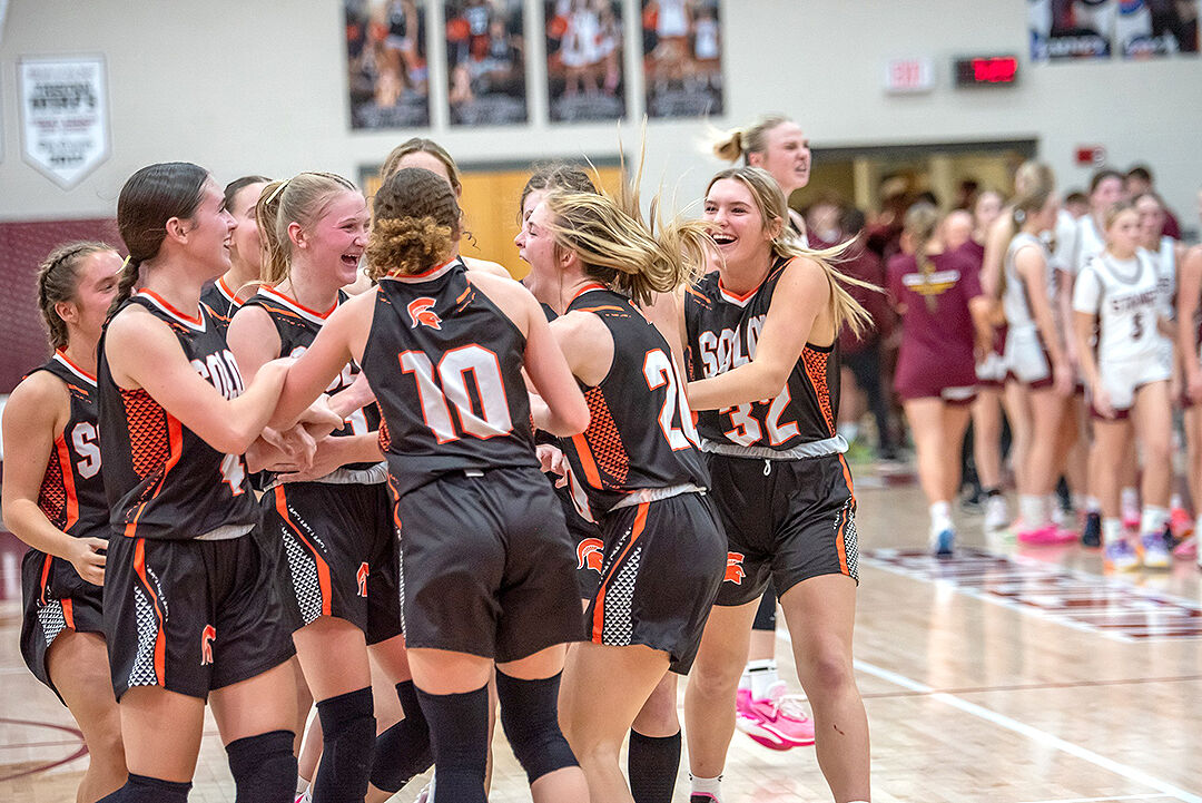 The Lady Spartans celebrate their 55-54 win over Mount Vernon, and the buzzer-beating three-point basket by Kobi Lietz that made it happen.