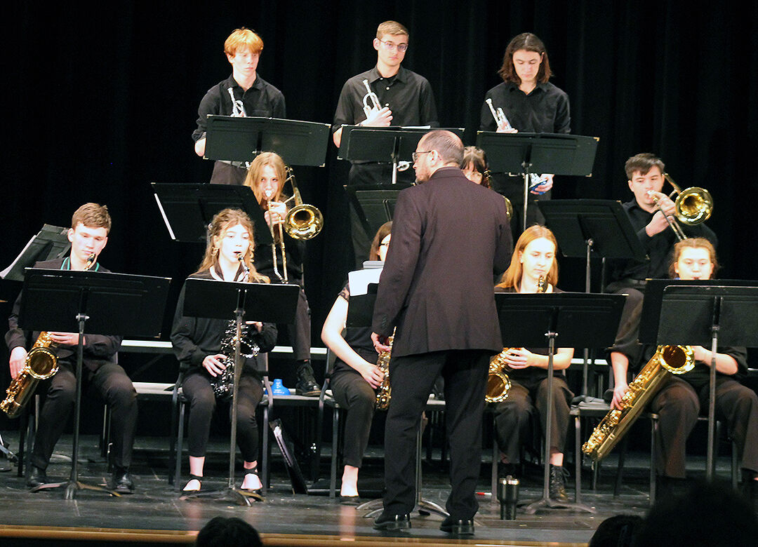 Back row (from left) &#8211; Ben Duckett, Daniel Tearse, and Owen Young. Middle &#8211; Andi Billerbeck, Meg D&#252;ster, and Jake Grimm. Front row &#8211; Jack Hosking, Morgan Holm, Jamison Grimm, Nora Fischer, and Gwen LaGrange perform under the direction of Desmond Cervantez at Lisbon&#8217;s first Jazz Festival Thursday, Jan. 25.