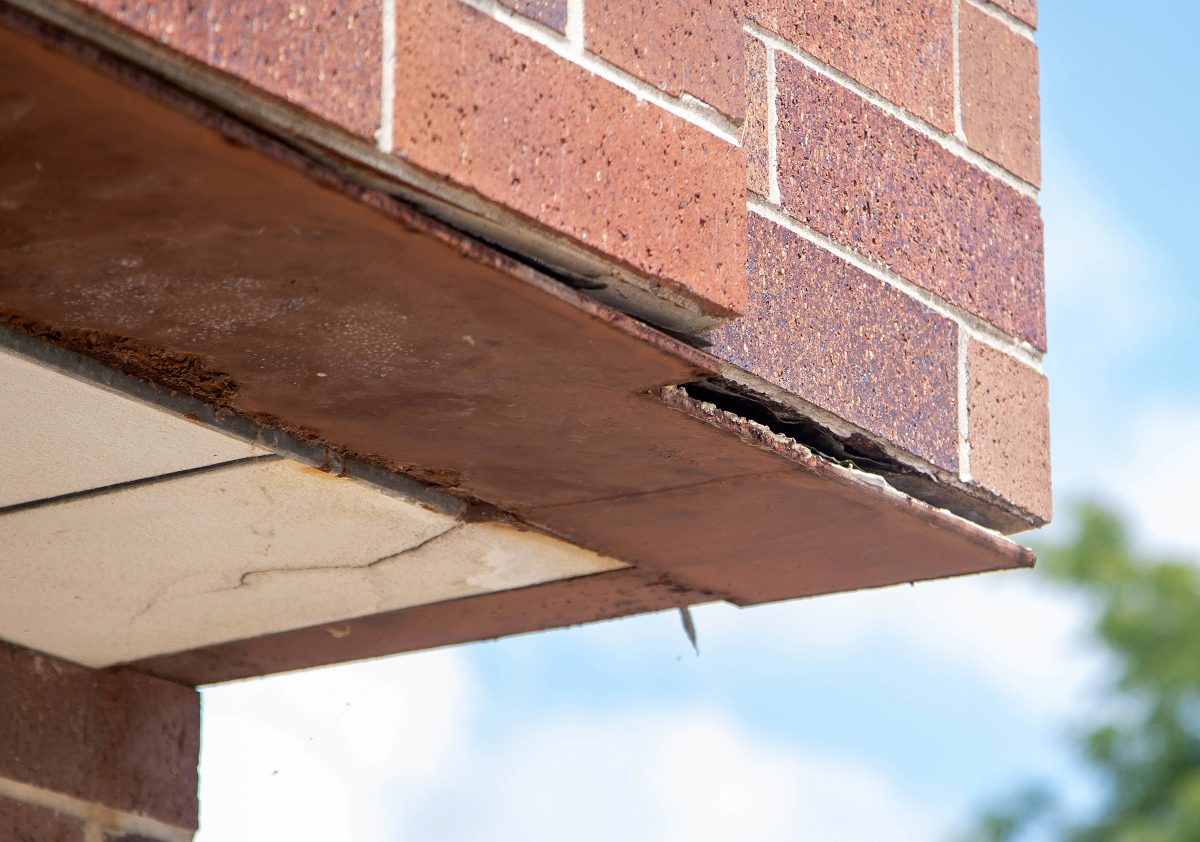 The iron support for the exterior brick wall of the upper level of the Johnson County Sheriff&#8217;s Office and Jail is rusting and separating from the brick. Axiom Consultants have found that the building structure is declining continuously.