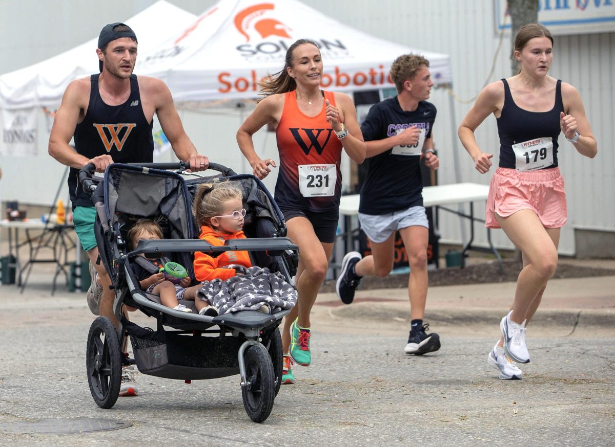 Runners (including Solon’s Emily Moser (231) and Annika Kruse) race each other during the 5k fun run at the Beef Days festival. The race began at 7:30 am Saturday morning and had 263 runners competing in it.