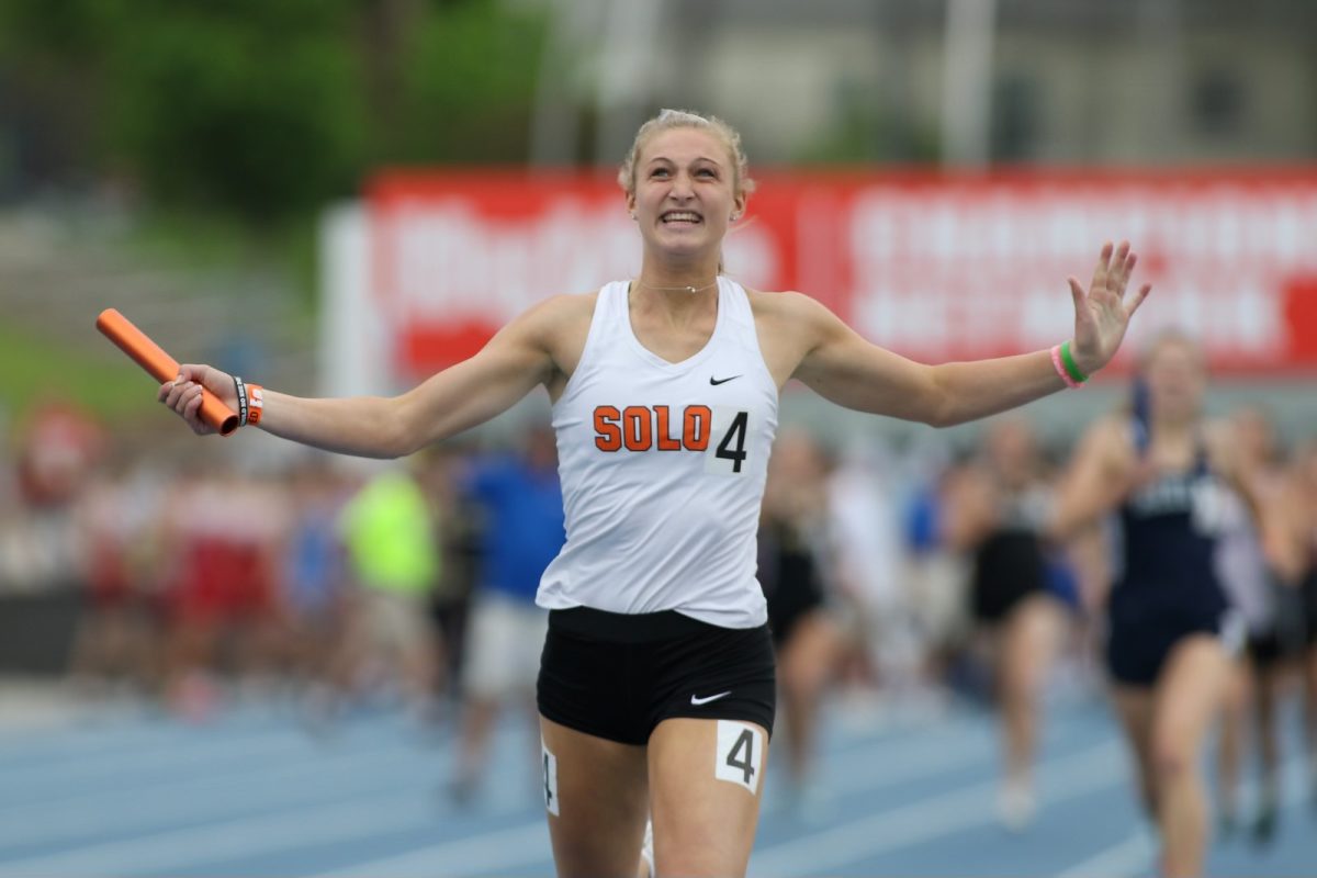 Erin Kerkhoff finishes a relay race during her high school career at Solon. Kerkhoff won 11 state medals and broke two school records during her time racing as a Lady Spartan. (Contributed)