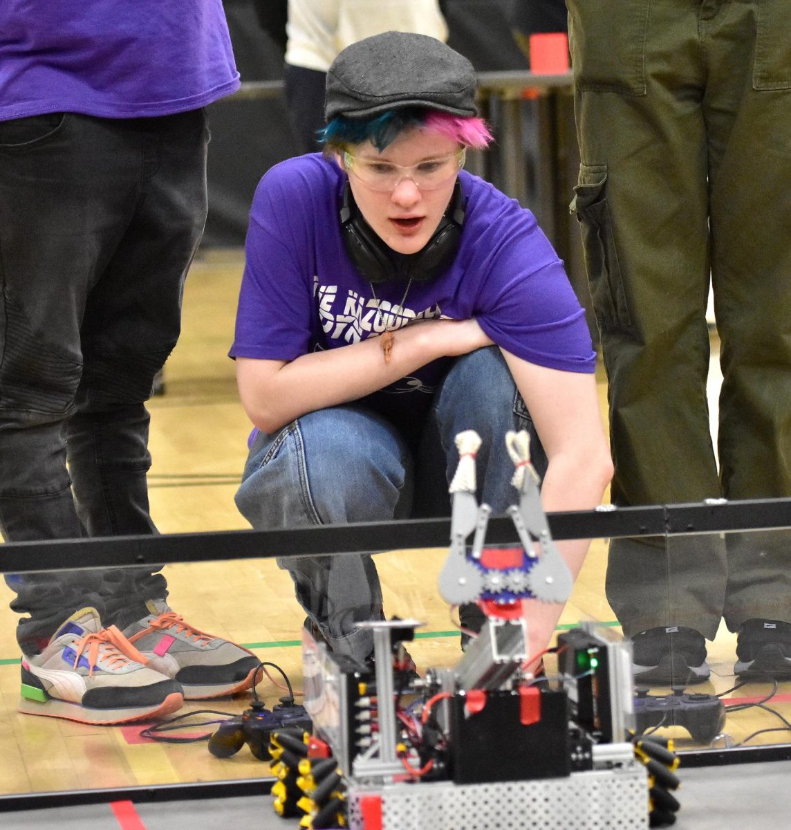 Phillip Miller prepares team 15055’s (“The Kazoodeler Dynasty) robot in the moments before competition Thursday, Nov. 30, 2023 at the Solon Community Center.