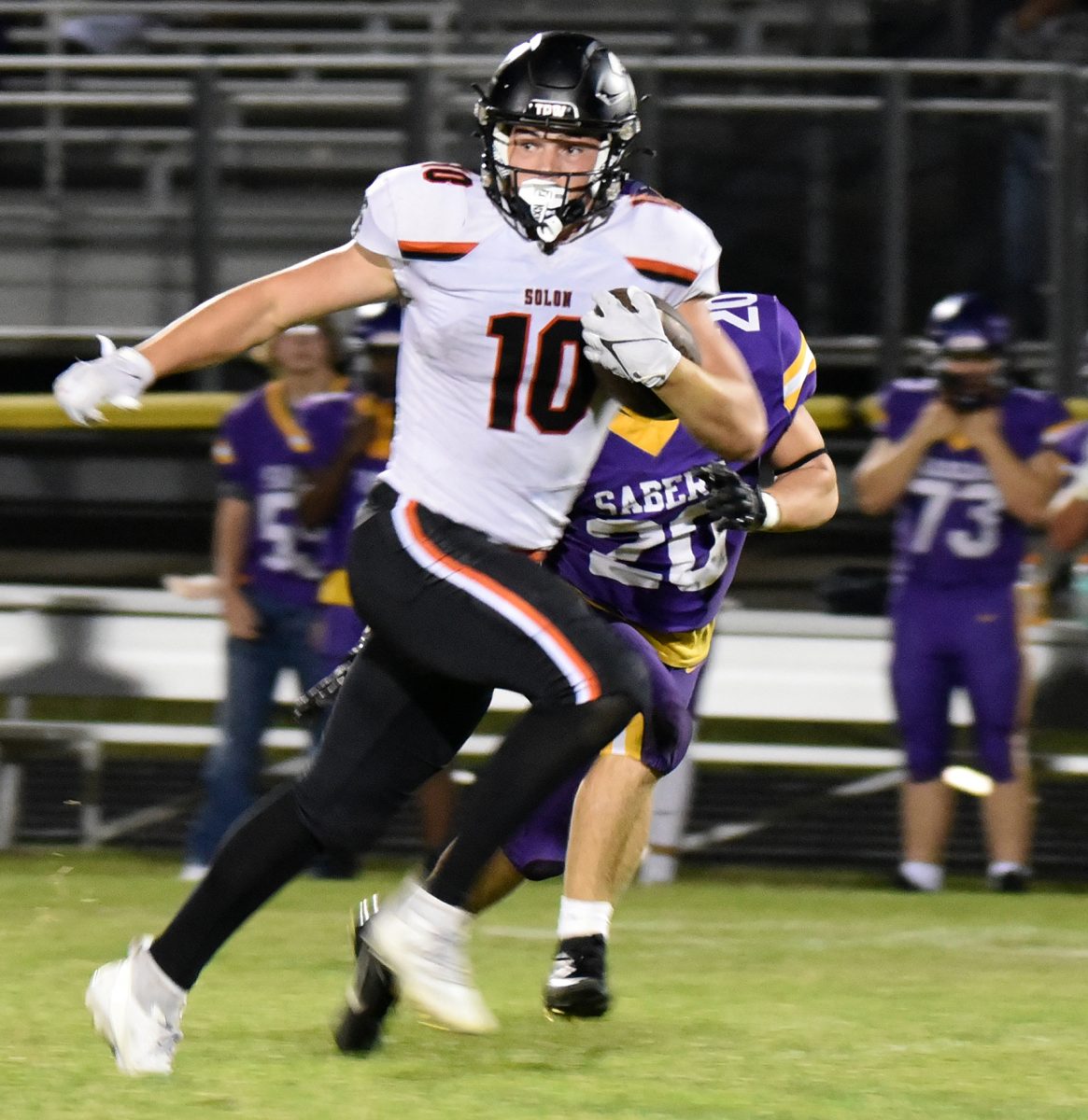 Eddie Johnson (10) runs for one of his two touchdowns against the Central DeWitt Sabers.