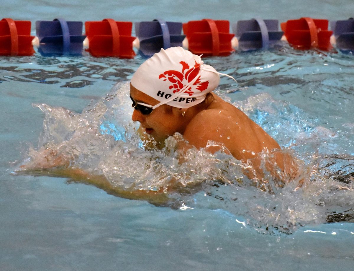 Solon senior Grace Hoeper won the varsity 200-yard IM and the 500-yard Freestyle events last Tuesday at Cedar Rapids Washington High School, easily out-pacing the field and besting the state qualifying times in both.