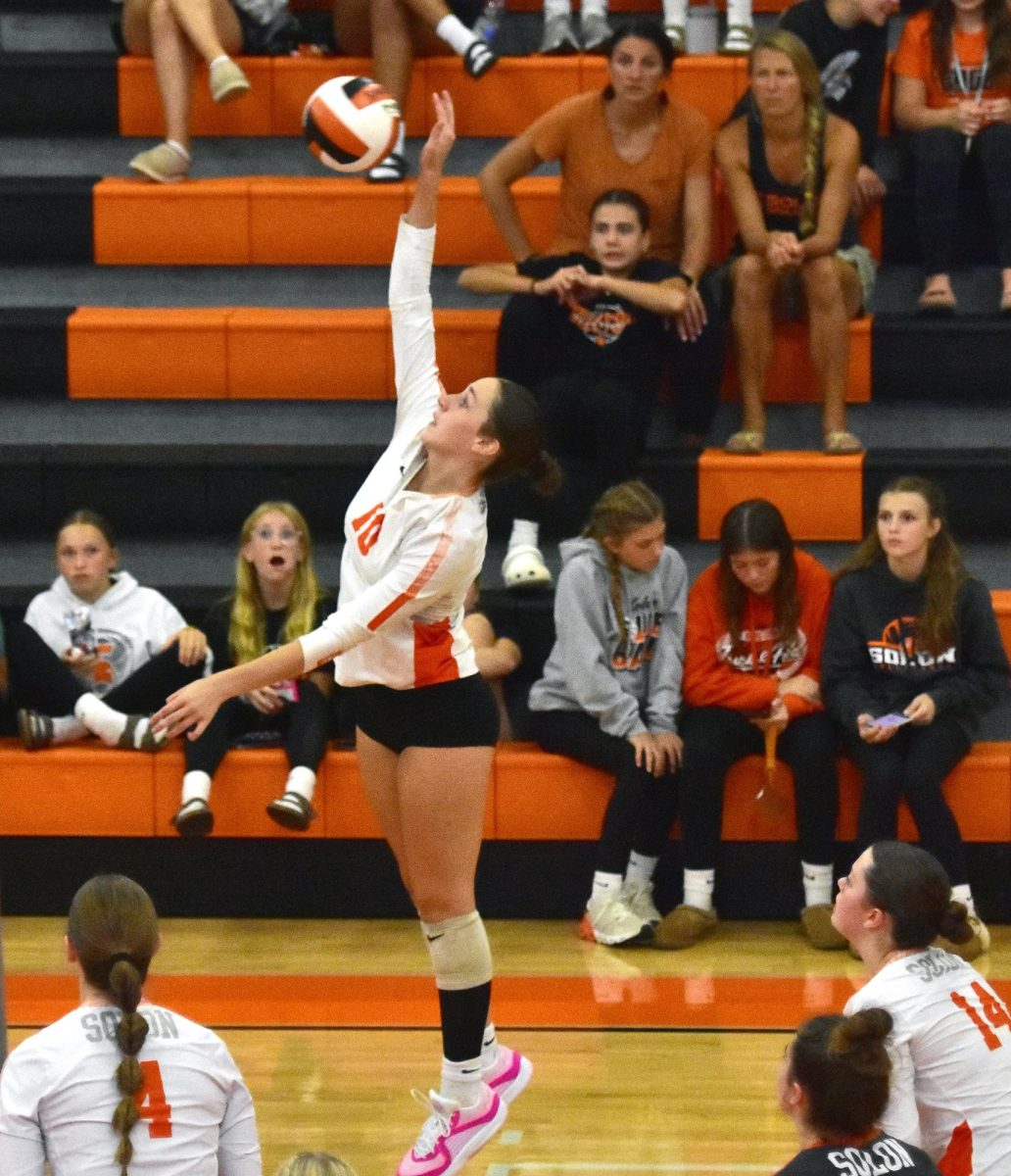 Gable Knight (10) slams the ball back to the Vikettes in varsity action at home last Thursday.