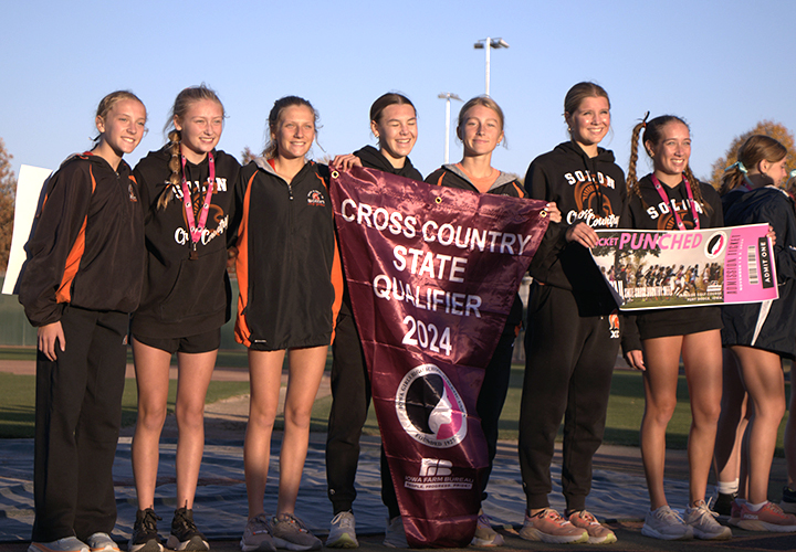 The varsity Lady Spartans celebrate their state meet qualification at the awards ceremony following a Class 3A Regional Meet last Wednesday at the SRNA. Solon won the meet and returns to Kennedy Park in Fort Dodge this Friday morning.