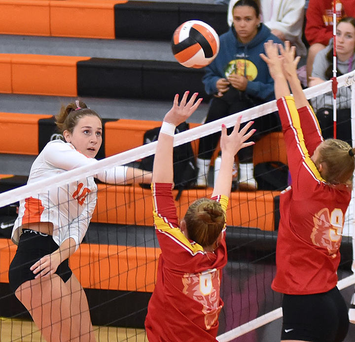 Gable Knight (10) pounds a kill shot over the net against Marion Tuesday, Sept. 24. The Lady Spartans fell 3-0 to the WaMaC East Wolves.