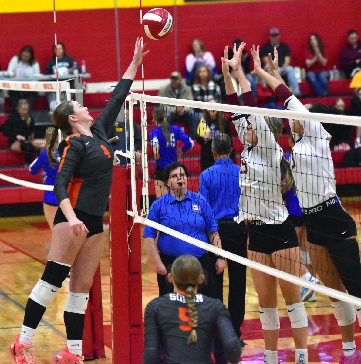 Grace Erwin (4) puts the ball over in action against Mount Vernon during last Thursday’s WaMaC Tournament at Marion High School. The archrival Mustangs beat Solon 2-0.