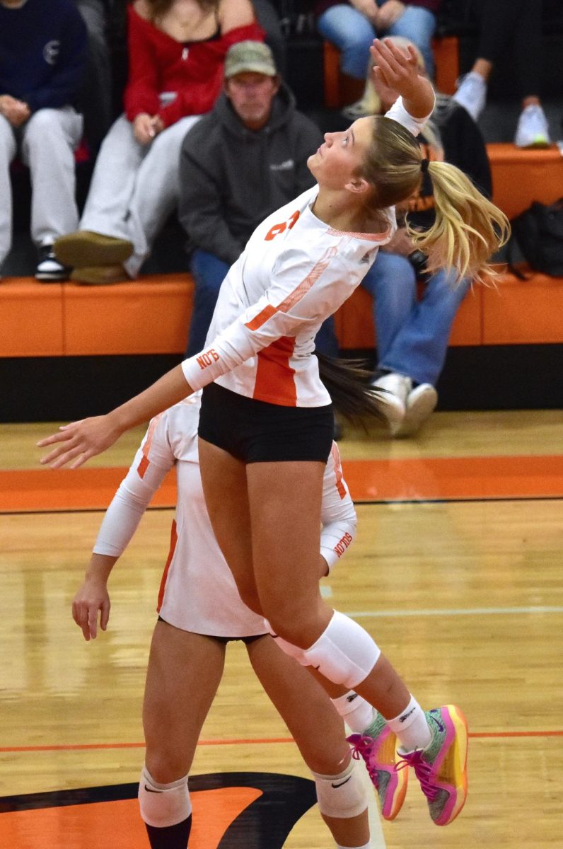 left: Jozie Lahr goes up for a kill attempt during a Class 3A Regional Semifinal match at home against Monticello last Thursday.